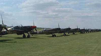 An impressive line-up of Spitfires & Hurricanes