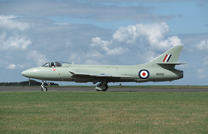 Hunter GA11 WV256/G-BZPB masquerading as prototype Hunter P.1067 WB188 cuts a fine outline as it taxies out for the finale of the show, the mass fly-past. The aircraft, an ex-FRADU machine, had its nose light removed and the standard rounded nose fitted especially for the event, as well as a new paint job of course. The result was truly magnificent.