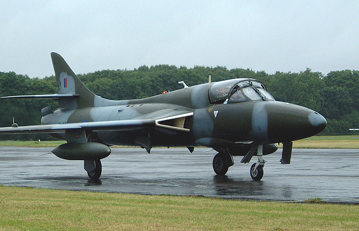 Another of CJAC's fleet taxies in after its arrival from Exeter. This time Hunter T7 XL573/G-BVGH taxies in following a heavy rain shower during Saturday afternoon to join the Hunter line for the following days display.