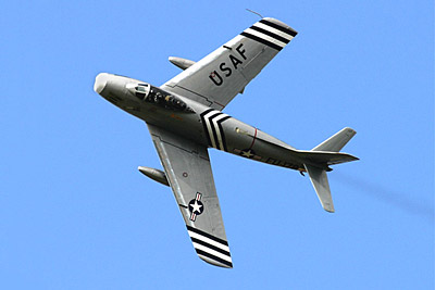 Golden Apple's F-86 soars over t'countryside